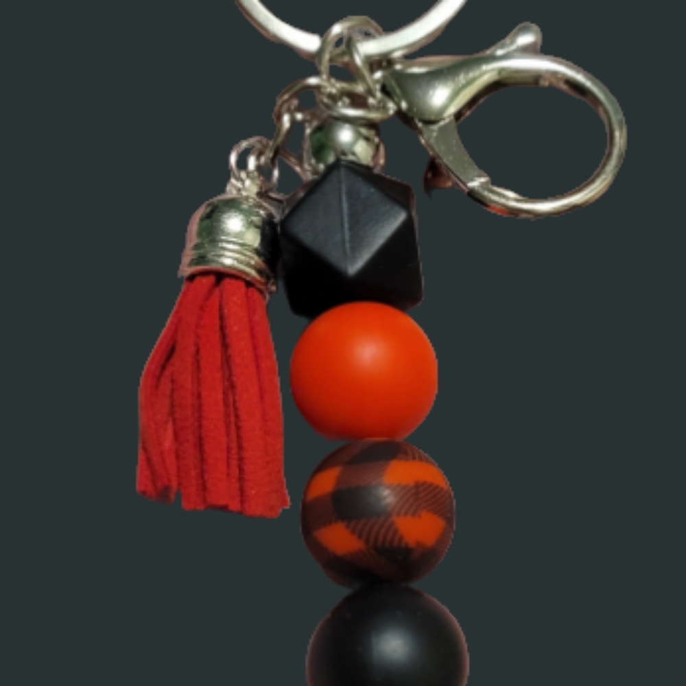 Red, black, plaid keychain with tassel
